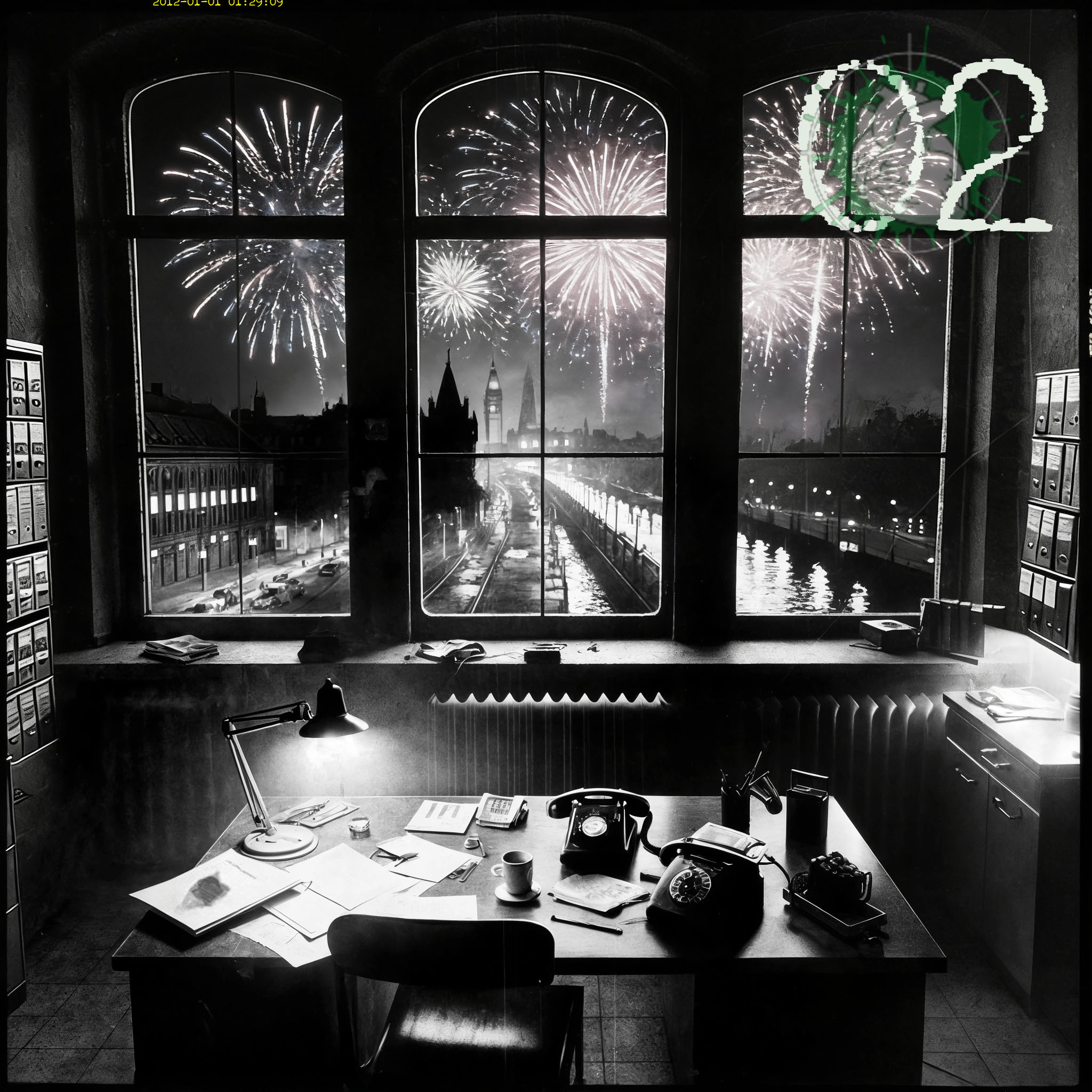 The cover art features a stark black-and-white photograph with a visible cut border. It shows a view from an office with a desk, phones, and papers onto a city with fireworks over a river at night.