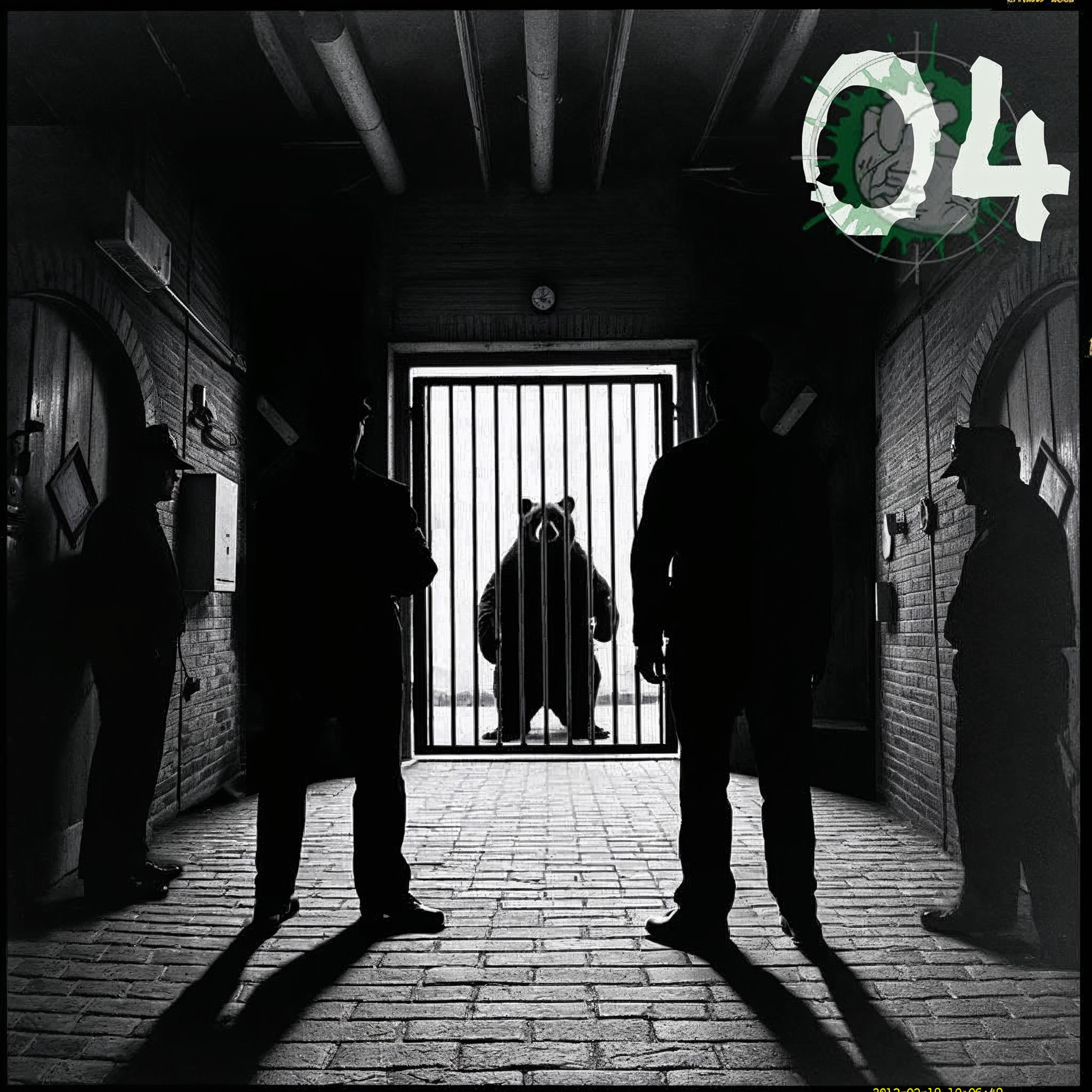 The cover art displays a black and white photograph: Four individuals dressed in dark attire are positioned in a hallway with brick walls, standing before a bear cage. Behind this bars, a bear figure stands upright. An overlay presents the number 04 above a pictogram of a human heart within a crosshair.